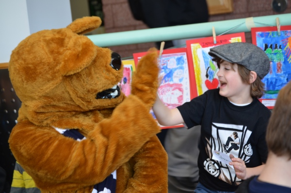 The Nittany Lion gets to know one of the young artists from The Walden School.